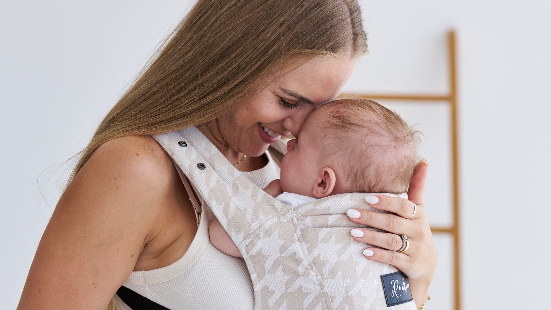 Verwöhne ich mein Baby durch Tragen?