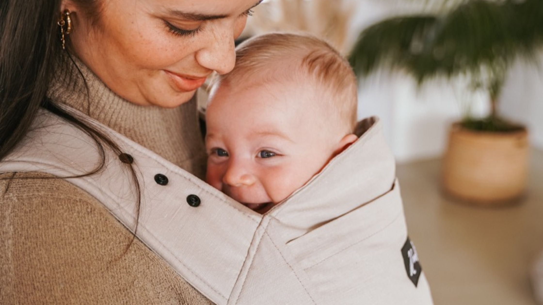 Getragene Babys weinen weniger